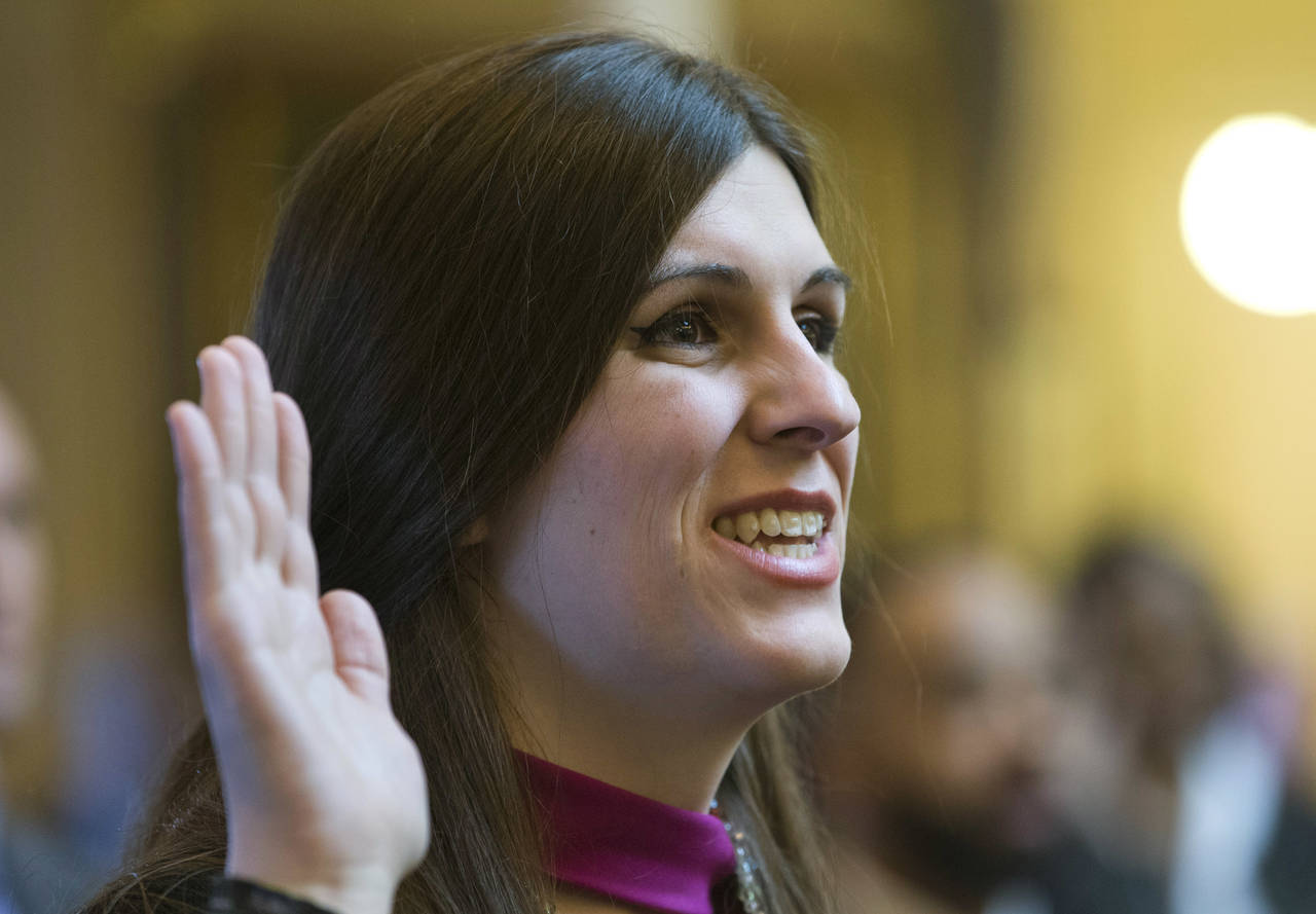 FILE - Del. Danica Roem, D-Prince William, the first transgender delegate, takes her oath of office...