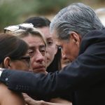 
              The archbishop of San Antonio, Gustavo Garcia-Siller, comforts families outside the Civic Center following a deadly school shooting at Robb Elementary School in Uvalde, Texas, Tuesday, May 24, 2022. (AP Photo/Dario Lopez-Mills)
            