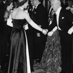 
              FILE - Queen Elizabeth II shakes hands with actor Charlie Chaplin at the Empire Theatre in London on Oct. 27, 1952 for Royal Film Show, a benefit performance to aid the Cinematograph Trade Benevolent Fund. (AP Photo, File)
            