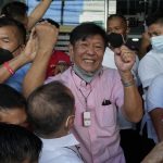
              Presidential candidate Ferdinand "Bongbong" Marcos Jr. celebrates as he greets the crowd outside his headquarters in Mandaluyong, Philippines on Wednesday, May 11, 2022. Marcos' apparent landslide victory in the Philippine presidential election is raising immediate concerns about a further erosion of democracy in Asia and could complicate American efforts to blunt growing Chinese influence and power in the Pacific. (AP Photo/Aaron Favila)
            