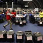 
              Election staff begin vote counting in Belfast in the Northern Ireland Assembly election early Friday in Belfast, Northern Ireland, Friday, May 6, 2022. (AP Photo/Peter Morrison)
            