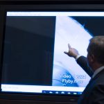 
              Deputy Director of Naval Intelligence Scott Bray points to a video display of a UAP during a hearing of the House Intelligence, Counterterrorism, Counterintelligence, and Counterproliferation Subcommittee hearing on "Unidentified Aerial Phenomena," on Capitol Hill, Tuesday, May 17, 2022, in Washington. (AP Photo/Alex Brandon)
            