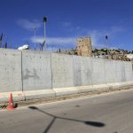 
              FILE - This May 24, 2017 file photo shows the newly built wall near Cilvegozu border gate in Reyhanli, at the Turkey-Syria border. Within a two-week span, Turkey's president has caused a stir by throwing a wrench in Sweden and Finland's historic bid to join the NATO alliance, lashed out at NATO-ally Greece and announced plans for a new incursion into Syria. The Turkish leader appears to be using Turkey's power to veto NATO's expansion as an opportunity to air a variety of grievances against the Western nations and to force them to take action against Kurdish militants and other groups that Turkey views as terrorists. (AP Photo/Burhan Ozbilici, File)
            