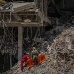 
              Rescuers search for survivors at the site of Friday's deadly explosion that destroyed the five-star Hotel Saratoga, in Havana, Cuba, Saturday, May 7, 2022. (AP Photo/Ramon Espinosa)
            