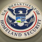 
              FILE - Homeland Security logo is seen during a joint news conference in Washington, Feb. 25, 2015. The Department of Homeland Security paused the work of its new disinformation governance board Wednesday. The move responds to weeks of criticism from Republicans and questions about whether the board would impinge on Americans’ free speech rights. A statement says DHS’ advisory board on homeland security will review the board’s work.  (AP Photo/Pablo Martinez Monsivais, File)
            