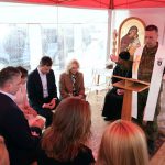 
              First lady Jill Biden sits with Slovakia's Prime Minister Eduard Hege as Capt. Frantisek Krusinsky, Priest from the Ordinariate of Slovak Armed Forces, leads a prayer in Vysne Nemecke, Slovakia, near the border with Ukraine, Sunday, May 8, 2022. (AP Photo/Susan Walsh, Pool)
            