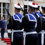 
              French President Emmanuel Macron reviews military troops during the ceremony of his inauguration for a second term at the Elysee palace, in Paris, France, Saturday, May 7, 2022. Macron was reelected for five years on April 24 in an election runoff that saw him won over far-right rival Marine Le Pen. (Gonzalo Fuentes/Pool via AP)
            
