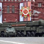 
              FILE - A Russian military Topol M intercontinental ballistic missile launcher rolls during the Victory Day military parade to celebrate 74 years since the victory in WWII in Red Square in Moscow, Russia, May 9, 2019. The defeat of Nazi Germany in World War II that Russia celebrates on May 9 is the country's most important holiday. This year it has special meaning amid the war in Ukraine, which the Kremlin calls a "special military operation" aimed to rid the country of alleged "neo-Nazis" — a false accusation derided by the West. (AP Photo/Alexander Zemlianichenko, File)
            