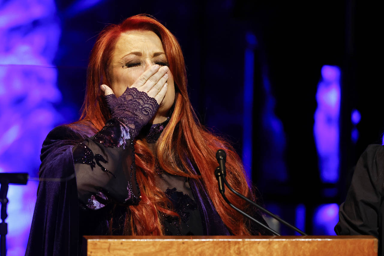 Wynonna Judd blows a kiss to attendees during the Medallion Ceremony at the Country Music Hall of F...