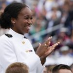 
              Midshipman Sarah Skinner, who is a Rhodes Scholar, reacts as President Joe Biden recognizes her during the U.S. Naval Academy's graduation and commissioning ceremony at the Navy-Marine Corps Memorial Stadium in Annapolis, Md., Friday, May 27, 2022. (AP Photo/Manuel Balce Ceneta)
            