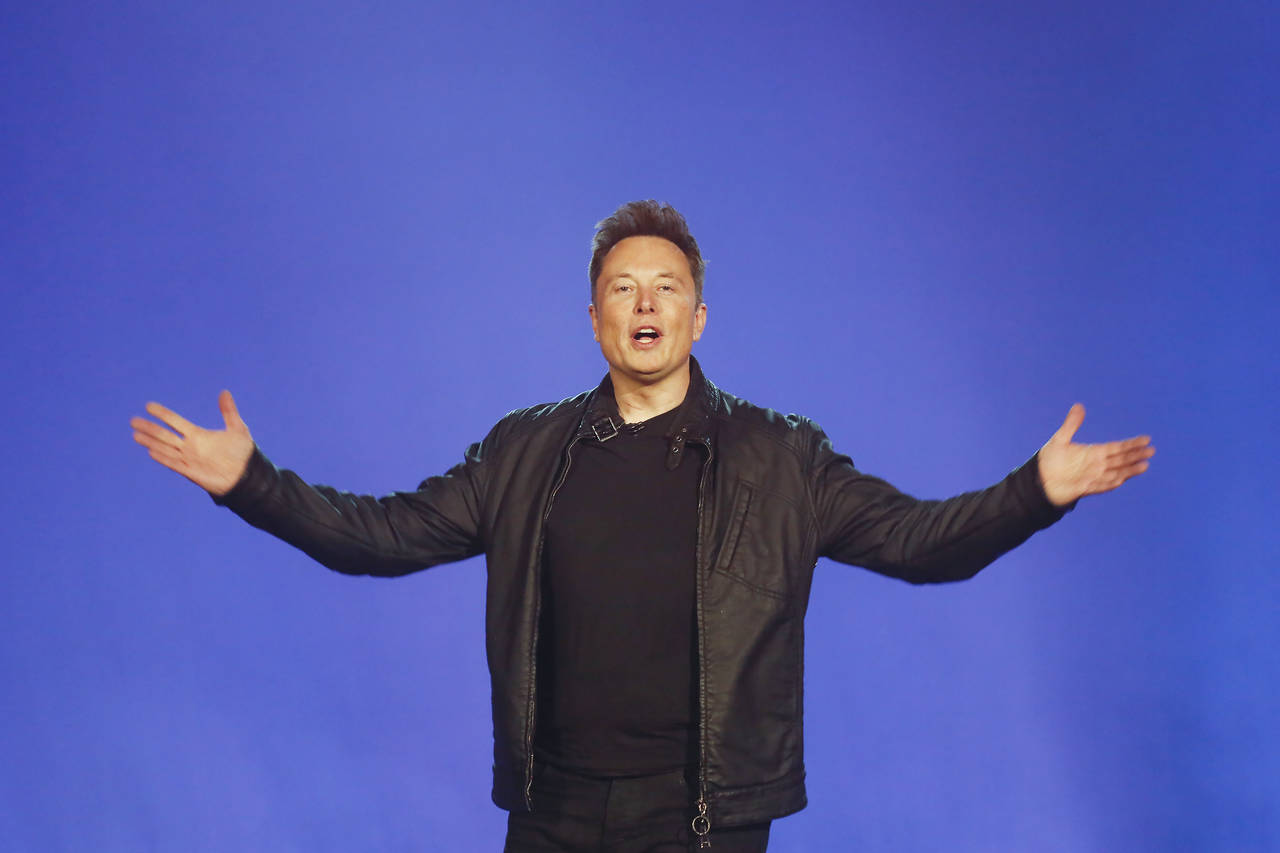 FILE - Tesla CEO Elon Musk introduces the Cybertruck at Tesla's design studio Thursday, Nov. 21, 20...