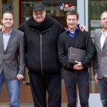
              Megaupload founder Kim Dotcom, second left, stands with Bram Van der Kolk, left, Mathias Ortmann and Finn Batato, right, outside the High Court in Auckland, New Zealand, Aug.9, 2012. Ortmann and van der Kolk, charged by U.S. prosecutors with racketeering for their involvement in the once wildly popular file-sharing website Megaupload, said Tuesday, May 10, 2022, that they have reached a deal to avoid extradition to the U.S. and will instead face charges in New Zealand, where they live. (Sarah Ivey/New Zealand Herald via AP)
            