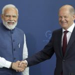 
              German Chancellor Olaf Scholz, right, and Indian Prime Minister Narendra Modi, left, shake hands after a joint press stratement as part of a meeting at the chancellery in Berlin, Germany, Monday, May 2, 2022. (AP Photo/Michael Sohn)
            