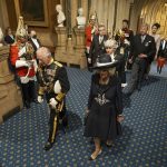 
              Britain's Prince Charles, left, and Camilla, Duchess of Cornwall, arrive for the State Opening of Parliament in the House of Lords at the Palace of Westminster, in London, Tuesday, May 10, 2022. Britain’s Parliament is opening a new year-long session with Prime Minister Boris Johnson trying to re-energize his scandal-tarnished administration and address the U.K.’s worsening cost-of-living crisis. (Aaron Chown/Pool Photo via AP)
            