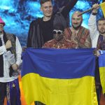 
              Kalush Orchestra from Ukraine celebrates after winning the Grand Final of the Eurovision Song Contest at Palaolimpico arena, in Turin, Italy, Saturday, May 14, 2022. (AP Photo/Luca Bruno)
            
