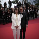 
              Tricia Cooke, left, and Ethan Coen pose for photographers upon arrival at the premiere of the film 'Forever Young' at the 75th international film festival, Cannes, southern France, Sunday, May 22, 2022. (AP Photo/Daniel Cole)
            