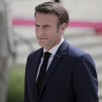 
              French President Emmanuel Macron reviews military troops during the ceremony of his inauguration for a second term at the Elysee palace, in Paris, France, Saturday, May 7, 2022. Macron was reelected for five years on April 24 in an election runoff that saw him won over far-right rival Marine Le Pen. (AP Photo/Lewis Joly)
            