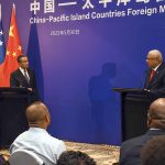 
              In this photo supplied by the Fiji government, China's Foreign Minister Wang Yi, left, and Fiji's Prime Minister Frank Bainimarama, right, speak at joint press conference at the Pacific Islands Foreign Ministers' meeting in Suva, Fiji, Monday, May 30, 2022. Wang Yi and a 20-strong delegation are in Fiji as part of an eight-nation Pacific Islands tour that comes amid growing concerns about Beijing's military and financial ambitions in the South Pacific region. (Fiji Government via AP)
            