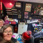 
              In this photo provided by Alison Dreith, she, bottom left, and a group of friends who all work in abortion support and advocacy have their photo made while getting tattoos on Thursday, April 7, 2022, in Richmond, Ind. Dreith's tattoo was a drawing of abortion pills. (Alison Dreith via AP)
            