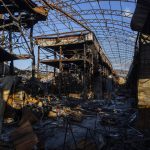 
              View of a shelled section of the Barabashovo market in Kharkiv, eastern Ukraine, Monday, May 23, 2022. (AP Photo/Bernat Armangue)
            