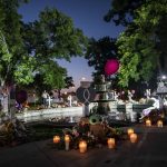 
              Candles are lit at dawn at a memorial site in the town square for the victims killed in this week's elementary school shooting on Friday, May 27, 2022, in Uvalde, Texas. (AP Photo/Wong Maye-E)
            