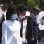 
              South Korea's new President Yoon Suk Yeol and his wife Kim Keon Hee attend his inauguration ceremony at the National Assembly in Seoul, South Korea, Tuesday, May 10, 2022. (Kim Hong-ji/Pool Photo via AP)
            