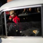 
              A child looks through a car windshield as his family waits to be processed upon their arrival from Vasylivka at a reception center for displaced people in Zaporizhzhia, Ukraine, Monday, May 2, 2022. Thousands of Ukrainian continue to leave Russian occupied areas. (AP Photo/Francisco Seco)
            
