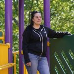 
              Erica Lafferty, whose mother Dawn Lafferty Hochsprung was killed during the Sandy Hook school shooting in 2012, poses for a picture on the playground honoring her mother in Watertown, Conn., Wednesday, May 25, 2022. A program manager at Everytown for Gun Safety and an advocate for universal background checks, Erica Lafferty said gains have been made quietly in states around the country. (AP Photo/Seth Wenig)
            