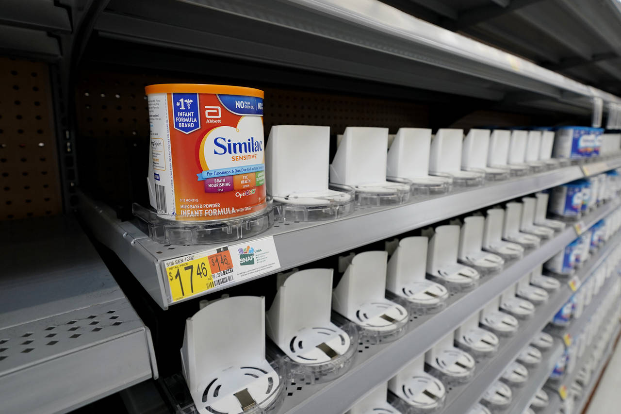 Shelves typically stocked with baby formula sit mostly empty at a store in San Antonio, Tuesday, Ma...