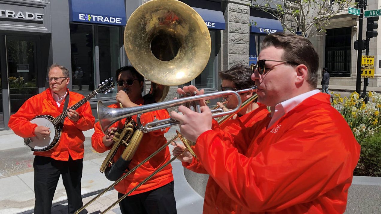 Dan Gabel, right, and fellow musicians perform in downtown Boston, Tuesday, May 10, 2022. Gabel has...