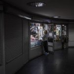 
              A woman arranges her shop inside the subway in Kharkiv, eastern Ukraine, Tuesday, May 24, 2022. Kharkiv subway resumed service on Tuesday morning after it was closed for more than two months during Russian attempt to capture the city. (AP Photo/Bernat Armangue)
            