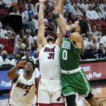 
              Boston Celtics forward Jayson Tatum (0) drives to the basket as Miami Heat guard Max Strus (31) attempts to block the shot during the second half of Game 7 of the NBA basketball Eastern Conference finals playoff series, Sunday, May 29, 2022, in Miami. (AP Photo/Lynne Sladky)
            