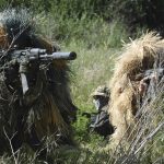 
              Ukrainian Territorial Defence Forces members train on the outskirts of Odesa, Ukraine, Tuesday, May 24, 2022. (AP Photo/Max Pshybyshevsky)
            