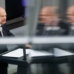 
              German Chancellor Olaf Scholz delivers his speech during a session of the German parliament Bundestag at the Reichstag building in Berlin, Germany, Wednesday, June 1, 2022. (AP Photo/Markus Schreiber)
            
