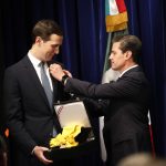 FILE - Mexican President Enrique Pena Nieto, right, decorates White House Senior Adviser Jared Kushner with Mexico's Order of the Aztec Eagle, in Buenos Aires, Argentina, Nov. 30, 2018. Donald Trump's son-in-law received Mexico's highest honor for helping to renegotiate the North American trade agreement. (AP Photo/Pablo Martinez Monsivais, File)