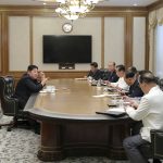 
              In this photo provided by the North Korean government, North Korean leader Kim Jong Un, left, attends a meeting of the ruling Workers’ Party’s Central Committee in Pyongyang, North Korea Sunday, June 12, 2022. Independent journalists were not given access to cover the event depicted in this image distributed by the North Korean government. The content of this image is as provided and cannot be independently verified. Korean language watermark on image as provided by source reads: "KCNA" which is the abbreviation for Korean Central News Agency. (Korean Central News Agency/Korea News Service via AP)
            