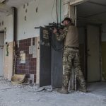 
              A Ukrainian soldier stands in position during heavy fighting on the front line in Severodonetsk, the Luhansk region, Ukraine, Wednesday, June 8, 2022. (AP Photo/Oleksandr Ratushniak)
            