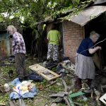 
              Residents recover belongings from their damaged home after a strike in Druzhkivka, Ukraine, Sunday, June 5, 2022. (AP Photo/Bernat Armangue)
            
