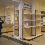 
              A visitor looks at an empty "Samsonite", suitcases and bags shop closed due to sanctions in a store in St. Petersburg, Russia, Tuesday, May 31, 2022. Many Western retailers have left Russia after the start of a military action in Ukraine. (AP Photo/Dmitri Lovetsky)
            