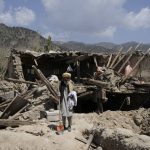 
              A man stands in front of his destroyed house after an earthquake in Gayan district in Paktika province, Afghanistan, Sunday, June 26, 2022. A powerful earthquake struck a rugged, mountainous region of eastern Afghanistan early Wednesday, flattening stone and mud-brick homes in the country's deadliest quake in two decades, the state-run news agency reported. (AP Photo/Ebrahim Nooroozi)
            