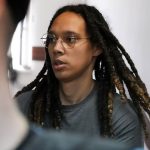 
              WNBA star and two-time Olympic gold medalist Brittney Griner is escorted to a courtroom for a hearing, in Khimki just outside Moscow, Russia, Monday, June 27, 2022. More than four months after she was arrested at a Moscow airport for cannabis possession, American basketball star Brittney Griner appeared in court Monday for a preliminary hearing ahead of her trial. (AP Photo/Alexander Zemlianichenko)
            