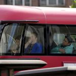 
              People travel on the top deck of a bus in London, Tuesday, June 21, 2022. Tens of thousands of railway workers walked off the job in Britain on Tuesday, bringing the train network to a crawl in the country’s biggest transit strike for three decades. (AP Photo/Matt Dunham)
            