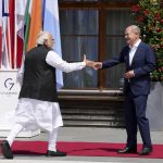
              German Chancellor Olaf Scholz, right, greets India's Prime Minister Narendra Modi during the official welcome ceremony of G7 leaders and Outreach guests at Castle Elmau in Kruen, near Garmisch-Partenkirchen, Germany, on Monday, June 27, 2022. The Group of Seven leading economic powers are meeting in Germany for their annual gathering Sunday through Tuesday. (AP Photo/Matthias Schrader)
            