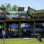 Destruction from Hurricane Ida is seen along Bayou Pointe-au-Chien, La., Thursday, May 26, 2022, nine months after the hurricane ravaged the bayou communities of southern Louisiana. (AP Photo/Gerald Herbert)