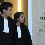 
              Salah Abdeslam's lawyers Olivia Ronen, right, and Martin Vettes arrive at the court room Wednesday, June 29, 2022 in Paris. Over the course of an extraordinary nine-month trial, the lone survivor of the Islamic State extremist team that attacked Paris in 2015 has proclaimed his radicalism, wept, apologized to victims and pleaded with judges to forgive his "mistakes." For victims' families and survivors of the attacks, the trial for Salah Abdeslam and suspected accomplices has been excruciating yet crucial in their quest for justice and closure. At long last, the court will hand down its verdict Wednesday. (AP Photo/Michel Euler)
            