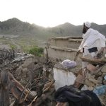 
              A man stands among destruction after an earthquake in Gayan village, in Paktika province, Afghanistan, Thursday, June 23, 2022. A powerful earthquake struck a rugged, mountainous region of eastern Afghanistan early Wednesday, flattening stone and mud-brick homes in the country's deadliest quake in two decades, the state-run news agency reported. (AP Photo/Ebrahim Nooroozi)
            