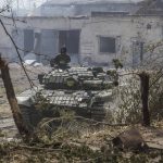 
              A Ukrainian tank is in position during heavy fighting on the front line in Severodonetsk, the Luhansk region, Ukraine, Wednesday, June 8, 2022. (AP Photo/Oleksandr Ratushniak)
            