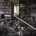 
              Destroyed library in the school where a graduation ceremony, called the Last School Bell, was supposed to take place in Kharkiv, Ukraine, Thursday, June 2, 2022. (AP Photo/Andrii Marienko)
            