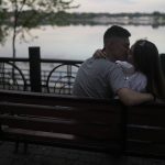 
              A couple kiss at Natalka Park in Kyiv, Ukraine, Tuesday, June 7, 2022. (AP Photo/Natacha Pisarenko)
            