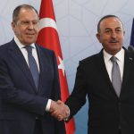 
              Russian Foreign Minister Sergey Lavrov, left, and Turkish Foreign Minister Mevlut Cavusoglu shake hands at the end of a joint news conference in Ankara, Wednesday, June 8, 2022. (AP Photo/Burhan Ozbilici)
            